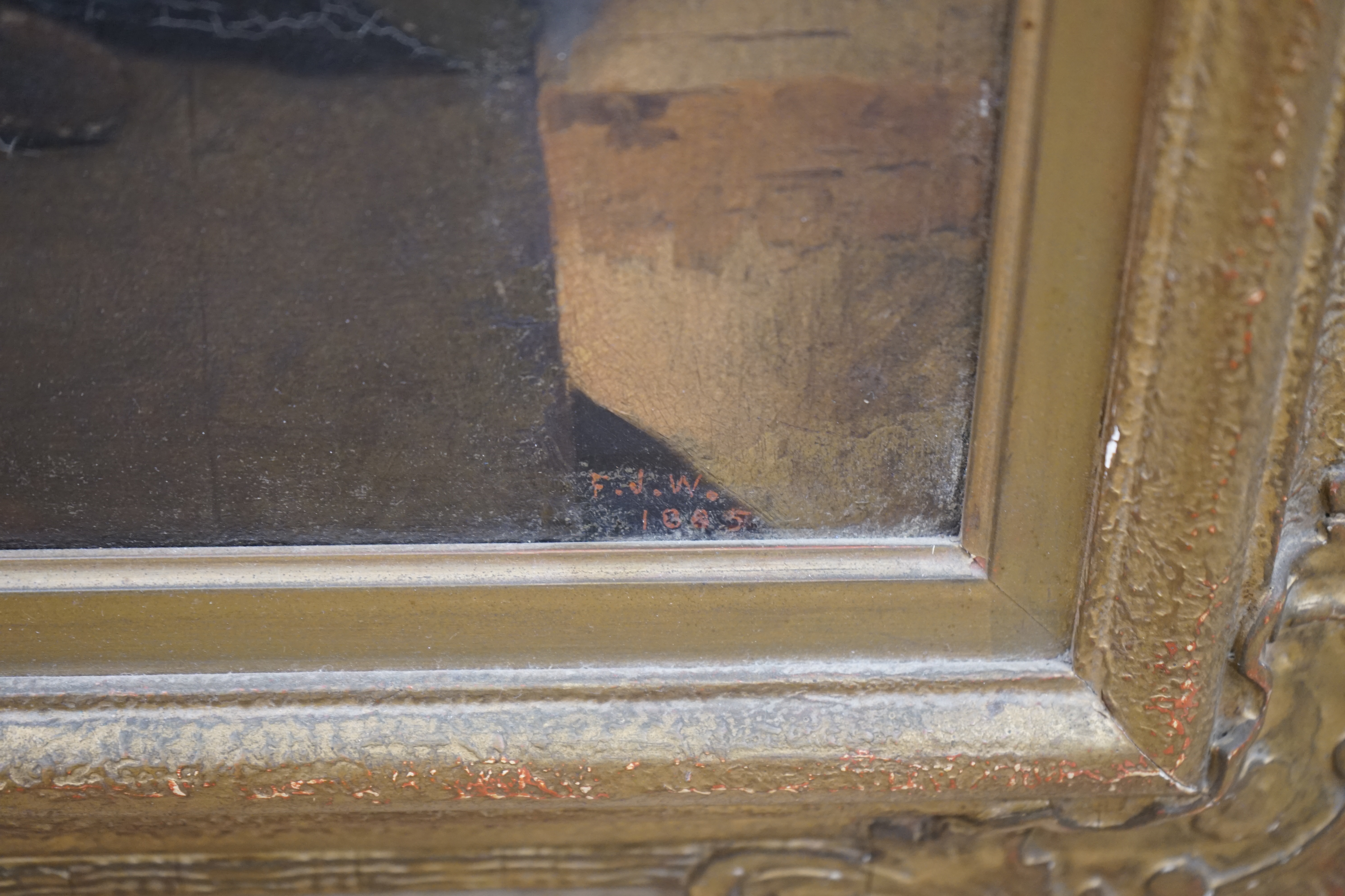 F.J.W., 19th century School, oil on canvas, Four children in an interior, initialled and dated 1885, 42 x 49cm. Condition - poor, dirt and craquelure all over